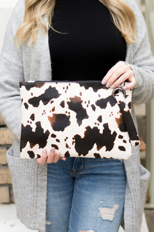 Aili's Corner Cow Print Oversized Clutch