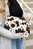 Aili's Corner Cow Print Oversized Clutch