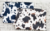 Aili's Corner Cow Print Oversized Clutch