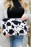 Aili's Corner Cow Print Oversized Clutch