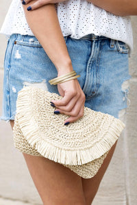 Aili's Corner Frayed Fold-over Straw Clutch
