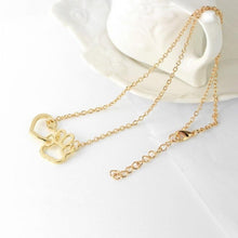 Load image into Gallery viewer, Hollow Pet Paw Footprint Necklaces 10E-J007