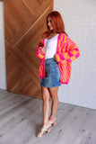 Davi & Dani Noticed in Neon Checkered Cardigan in Pink and Orange