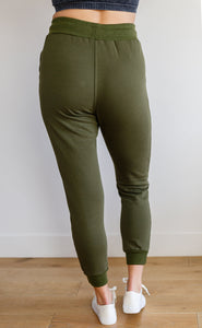 WHITE BIRCH Kick Back Distressed Joggers in Olive